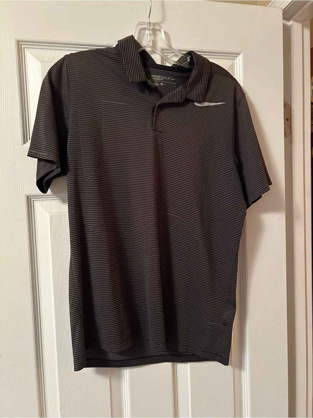 Nike Men’s Black Micro-Striped Polo with Swoosh